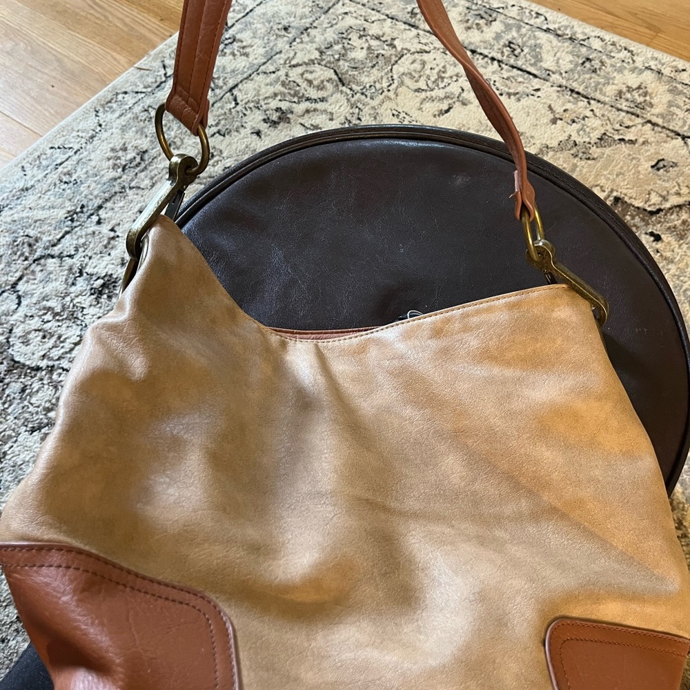 Bueno handbag hobo style two tone tan/beige and lighter brown colored.